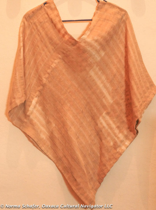 Hand-woven, nut-dyed quechquemitl with ikat dyed warp threads by Alfredo Orozco, $85 USD